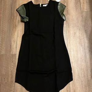 House of Wallace black dress with green sleeves